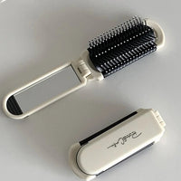 Foldable Hair Brush with Mirror | Portable Travel Comb – Compact & Stylish Design for Everyday Use